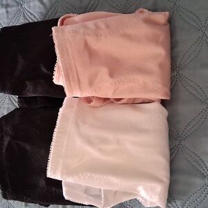 Control Briefs By Underscore. Pink, White, and 2 Black.